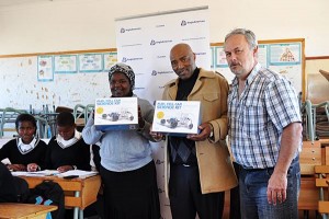 Handing over the equipment to Mr Batala